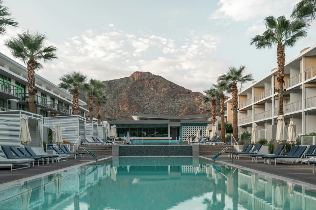 Elegant resort poolside view in Scottsdale, AZ, emphasizing relaxation and luxury.