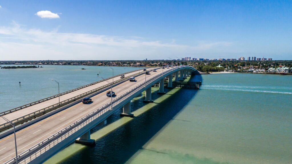 Aerial view of Jolley Bridge connecting Marco Island, Florida on a clear day.