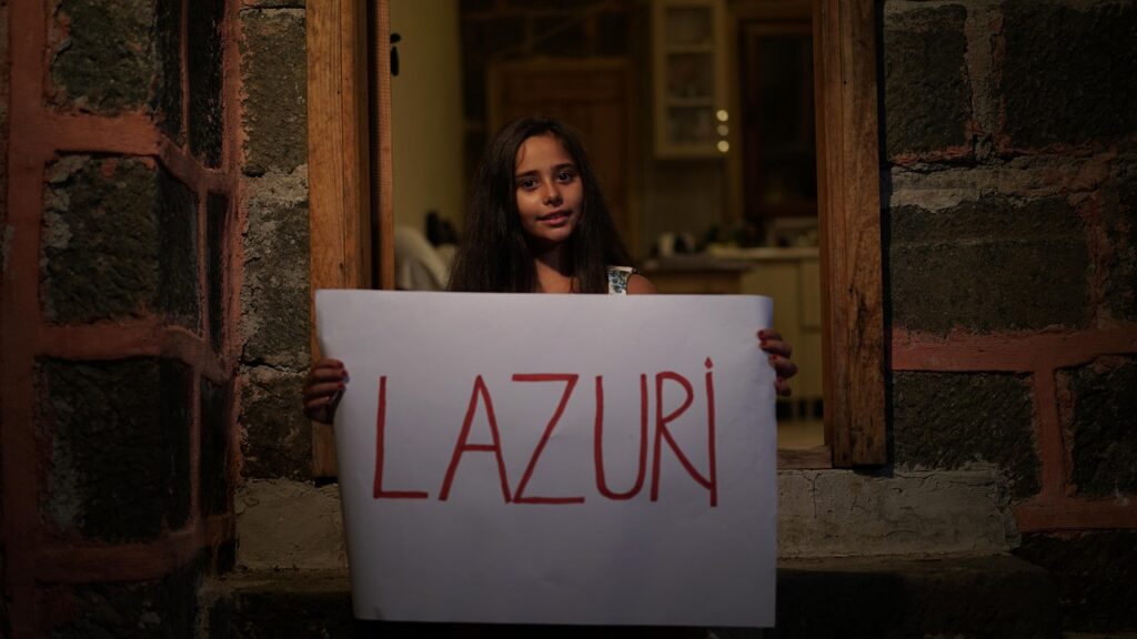 lazuri, banner, girl, young woman, female, word, language, megrelian, laz language, mingrelian language, endangered language, pose, village, portrait