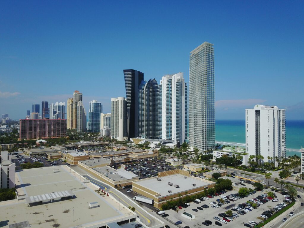 High-rise buildings along the coast of Sunny Isles Beach, Florida on a clear day.