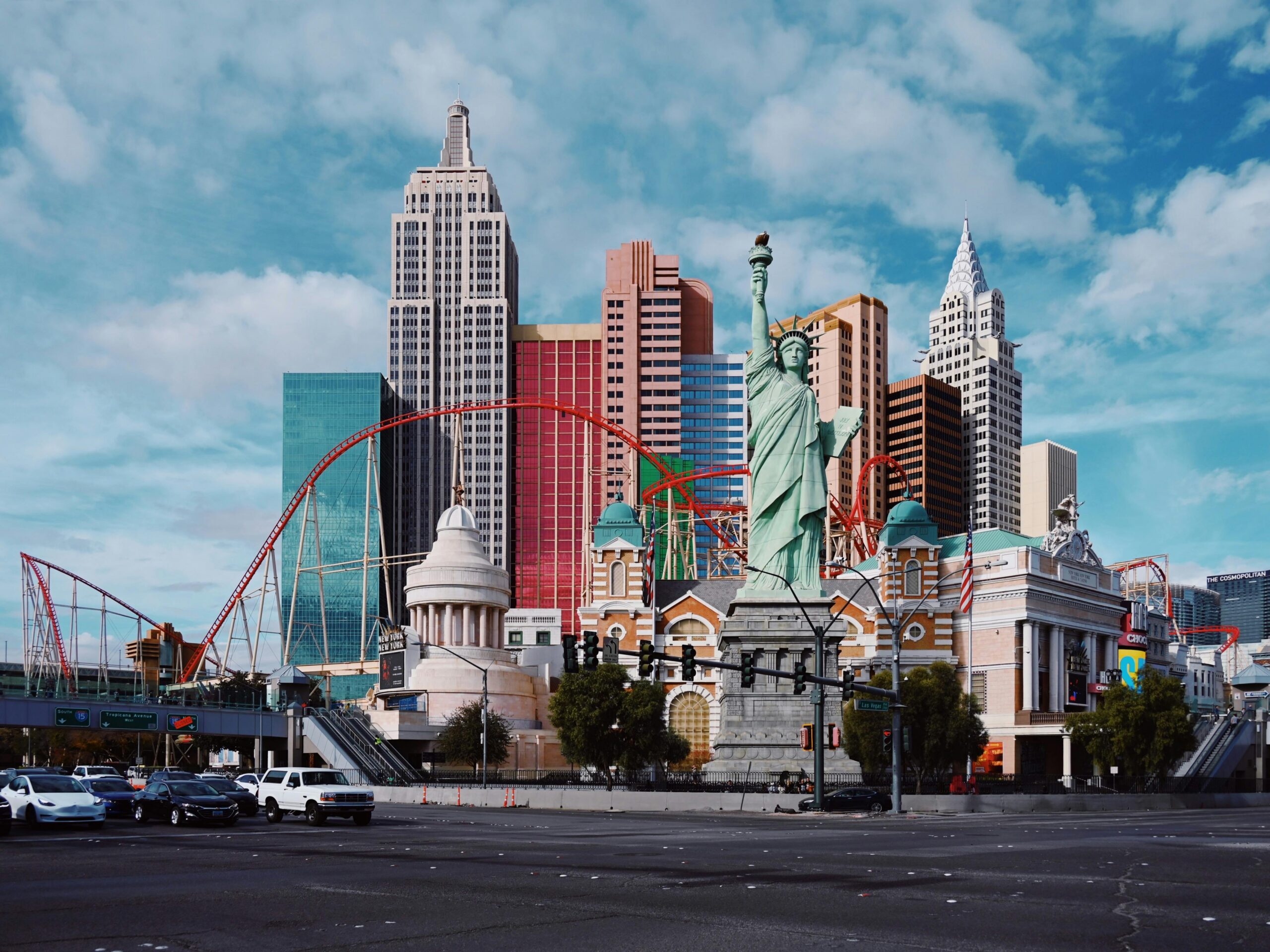 Colorful cityscape in Las Vegas featuring iconic replicas and vibrant architecture.