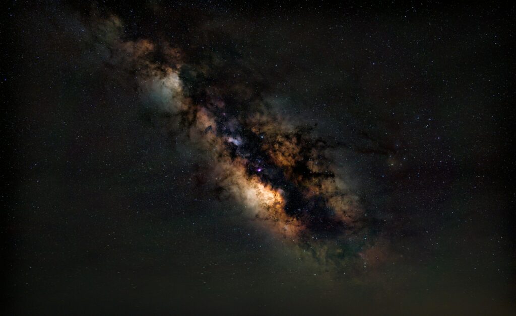 A breathtaking view of the Milky Way galaxy illuminating the night sky above Valencia, Spain.