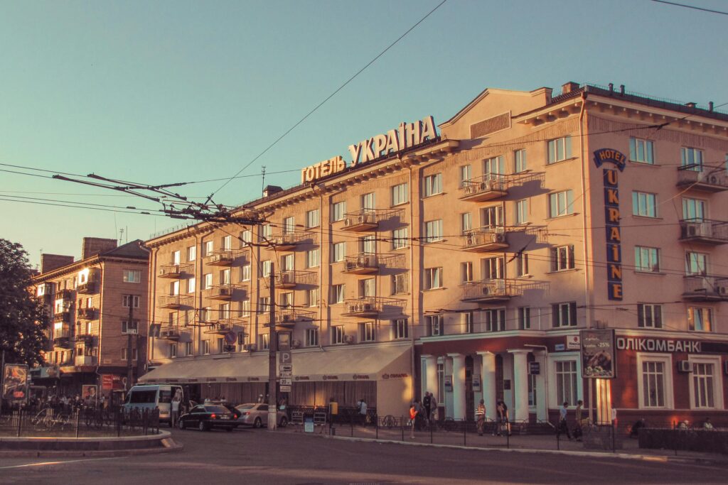 View of the historic Hotel Ukraine in Chernihiv, captured during a warm day.
