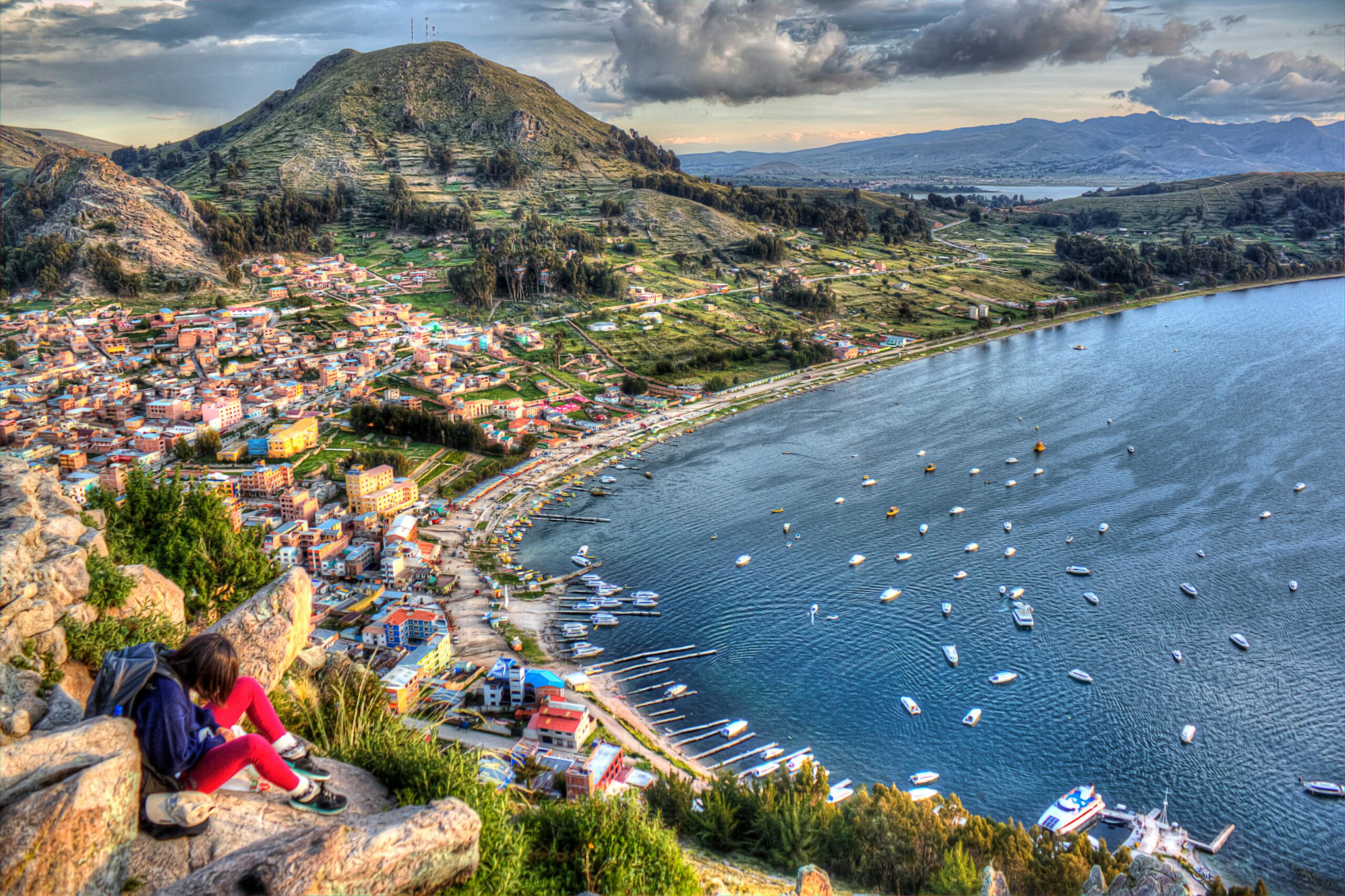A breathtaking view of Copacabana and Lake Titicaca, showcasing vibrant landscapes and serene waters.