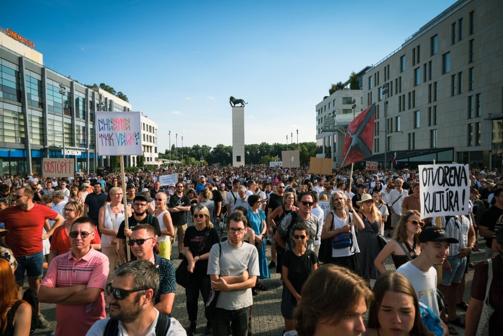 A large crowd gathers in Bratislava for a peaceful cultural protest.