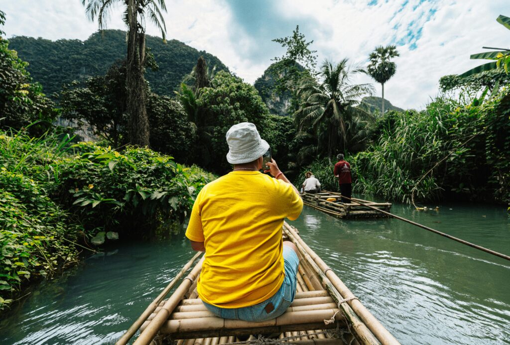 Experience the lush jungle of Krabi with a tranquil bamboo rafting adventure.