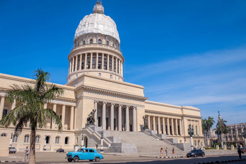 The stunning El Capitolio building in Havana, Cuba, under blue skies captures historical Cuban architecture.