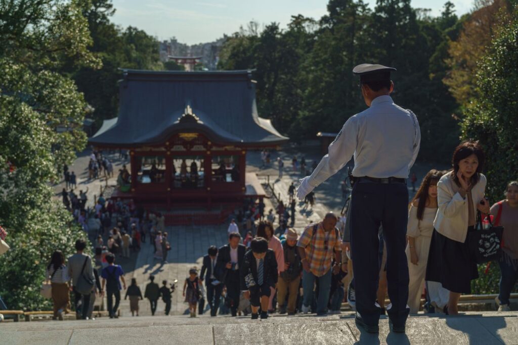 Visitors explore the historic Tsurugaoka Hachimangu Shrine in Kamakura, Japan.