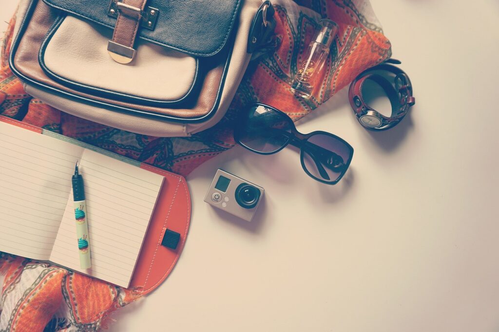 go pro, pen, notepad, travel, vacation, journal, diary, bag, accessories, holiday, flat lay, travel, travel, travel, travel, travel, vacation, accessories