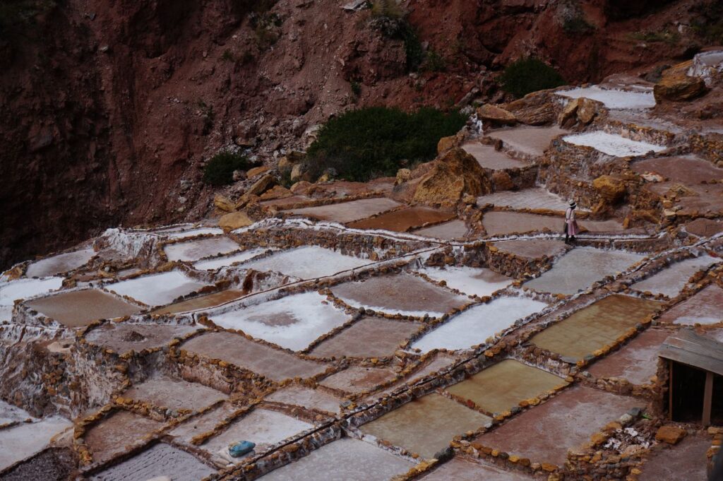 A breathtaking view of the historic Maras salt mines in Peru, showcasing traditional salt extraction.