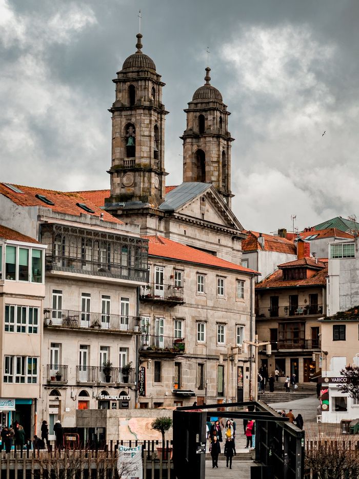 Stunning view of historic churches and urban cityscape in Vigo, Galicia, Spain.
